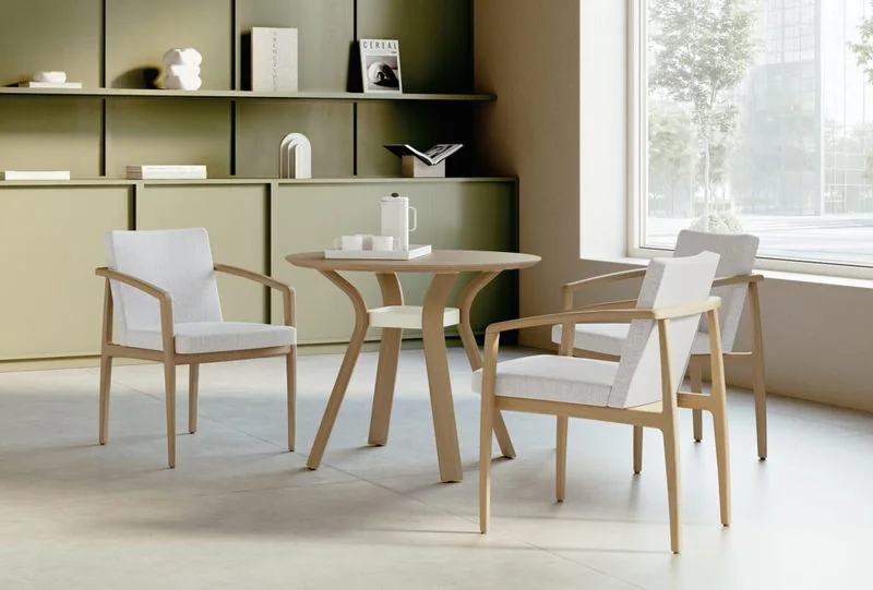 Café Table and Chairs Light wood café table with upholstered armchairs