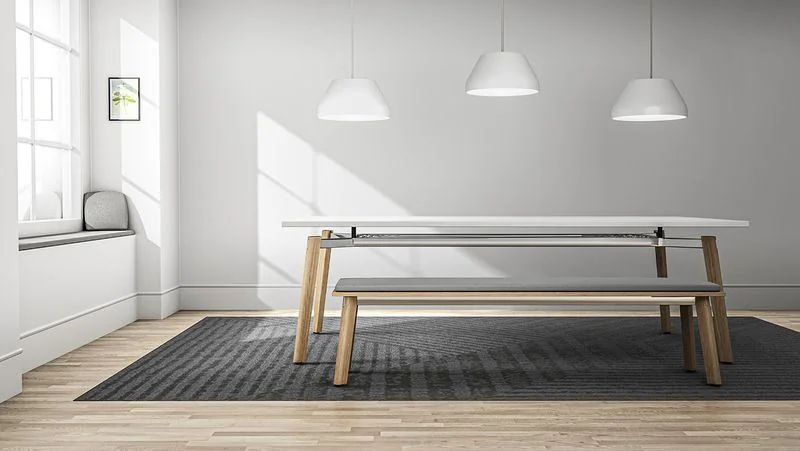 Café Table and Bench Long light wood table with a bench beneath pendant lights