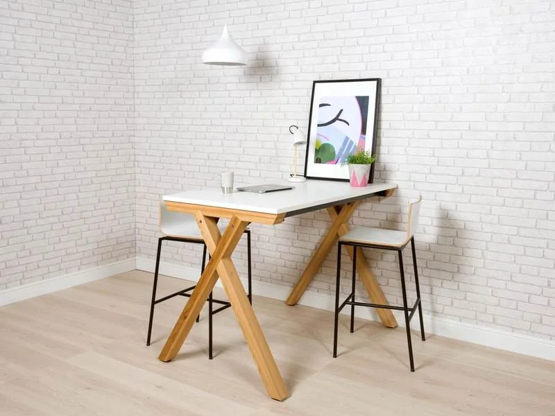 Standing-Height Table White standing-height table with a wood stool