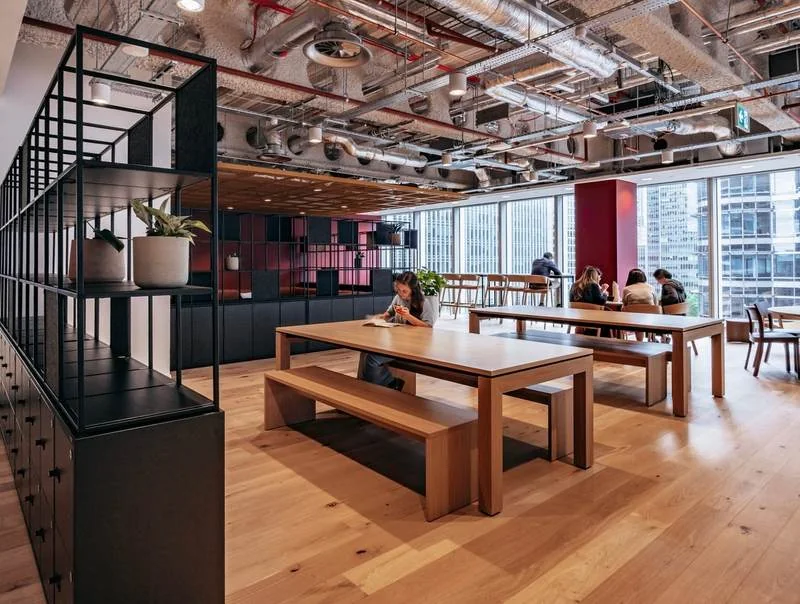 Café Dining Area Wood communal tables and benches in a loft café