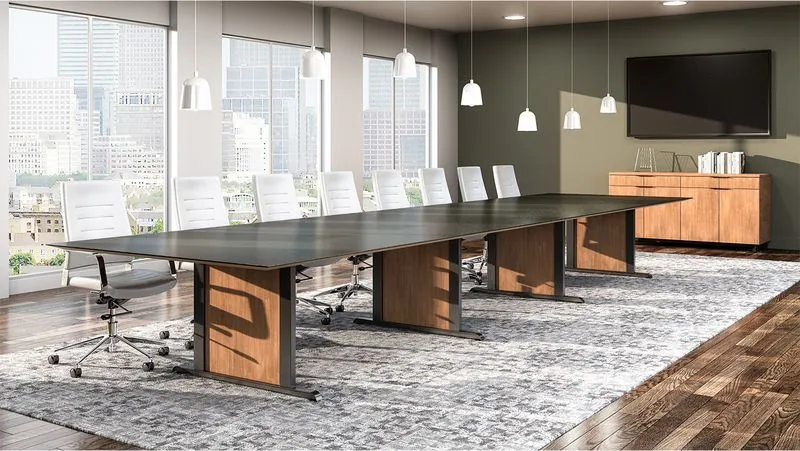 Boardroom Dark conference table with wood-accent bases in a city-view boardroom