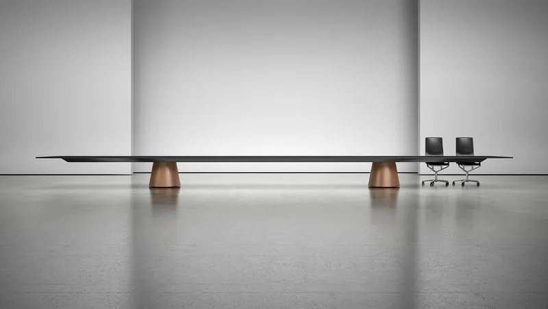 Boardroom Table Extra-long boardroom table with wood drum bases