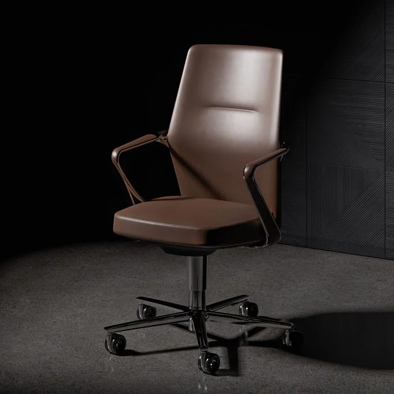 Leather Executive Chair Brown leather executive chair with chrome frame on a dark backdrop