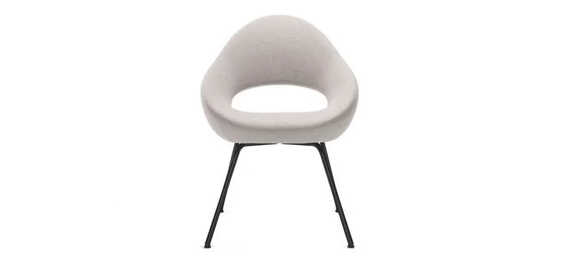 White sculpted shell side chair on slim legs
