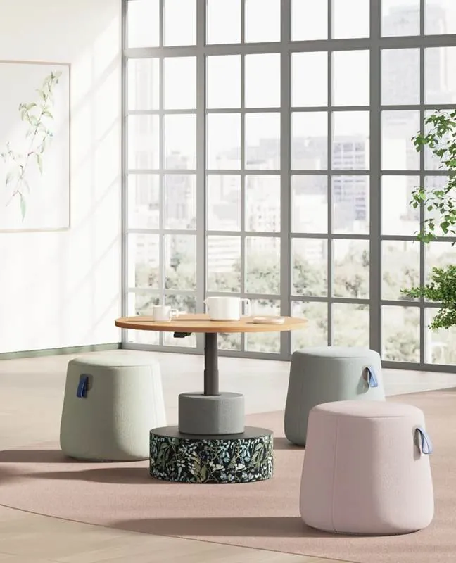 Adjustable Café Table Adjustable café table with ottomans by a window
