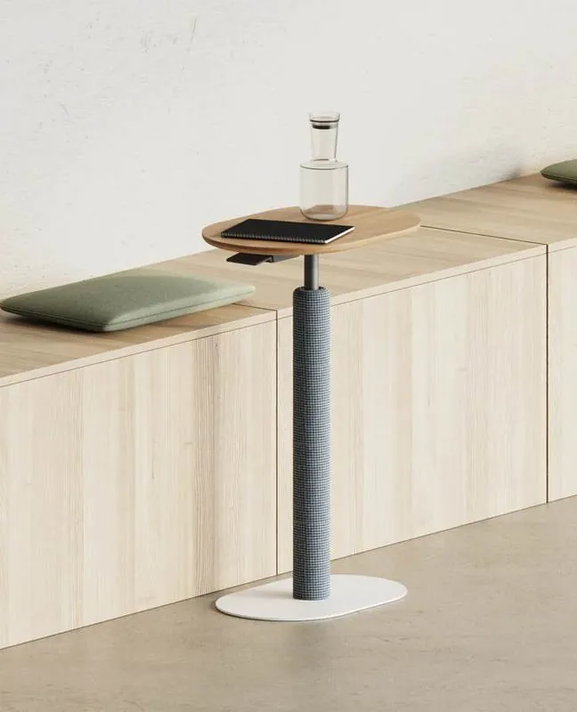 Adjustable Perch Table Adjustable perch table beside a wood bench