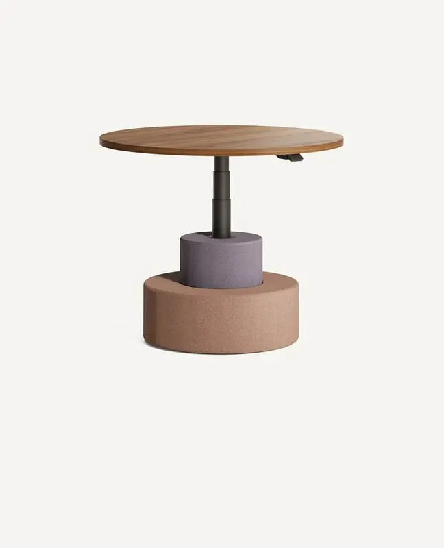 Adjustable Round Table Height-adjustable round table on an upholstered base