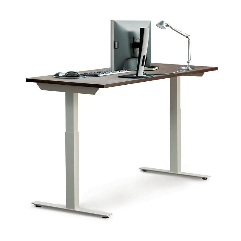 Sit-Stand Desk Sit-stand desk with dark top, monitor and desk lamp