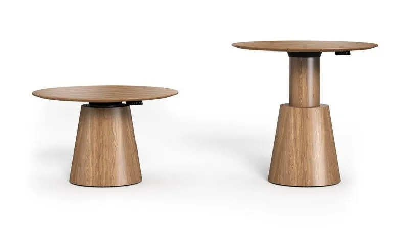 Adjustable Round Tables Two height-adjustable round tables shown low and raised