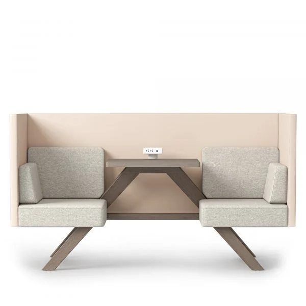 Blush and cream lounge booth with a center table