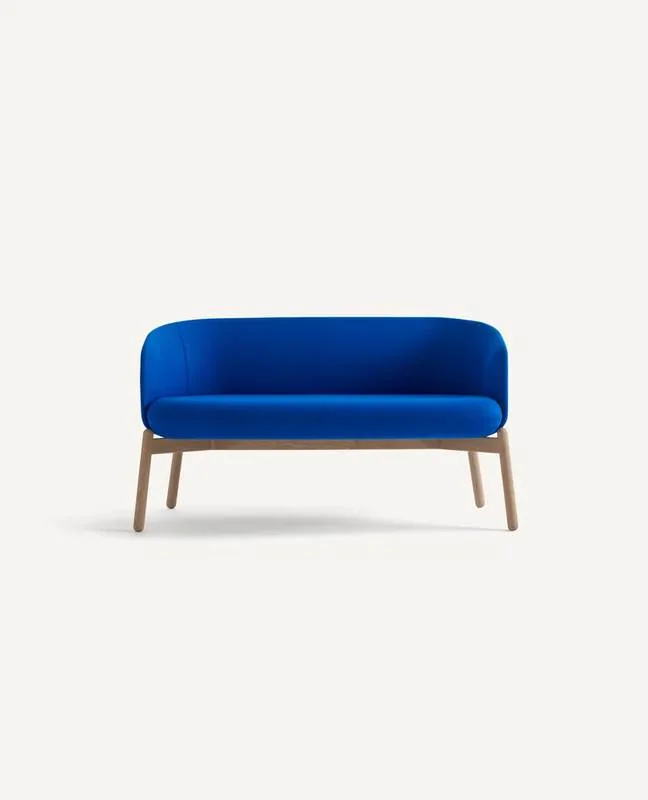 Cobalt blue loveseat on wood legs