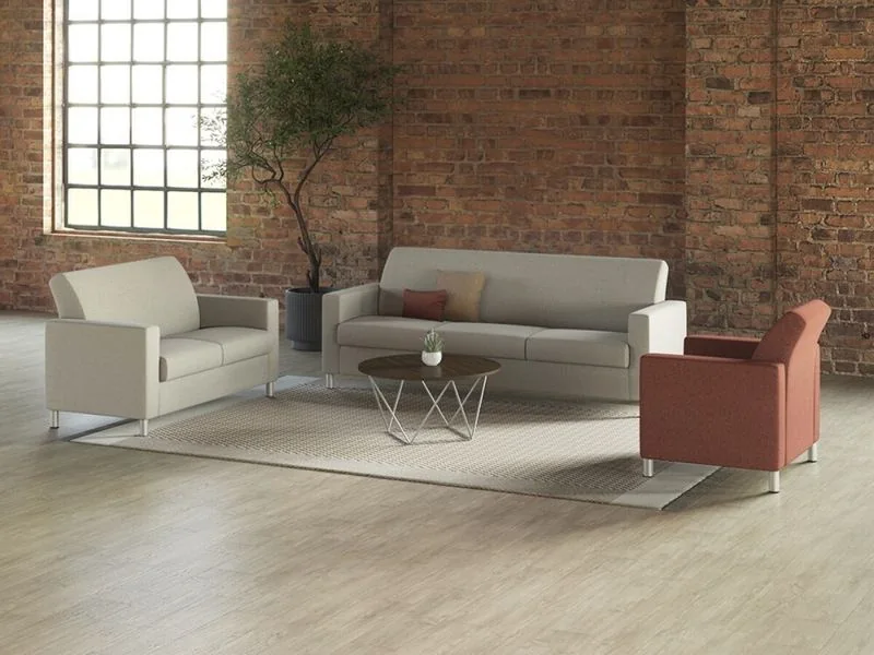 Cream and terracotta modular seating against a brick wall