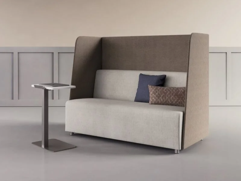 Gray high-back loveseat with a side table
