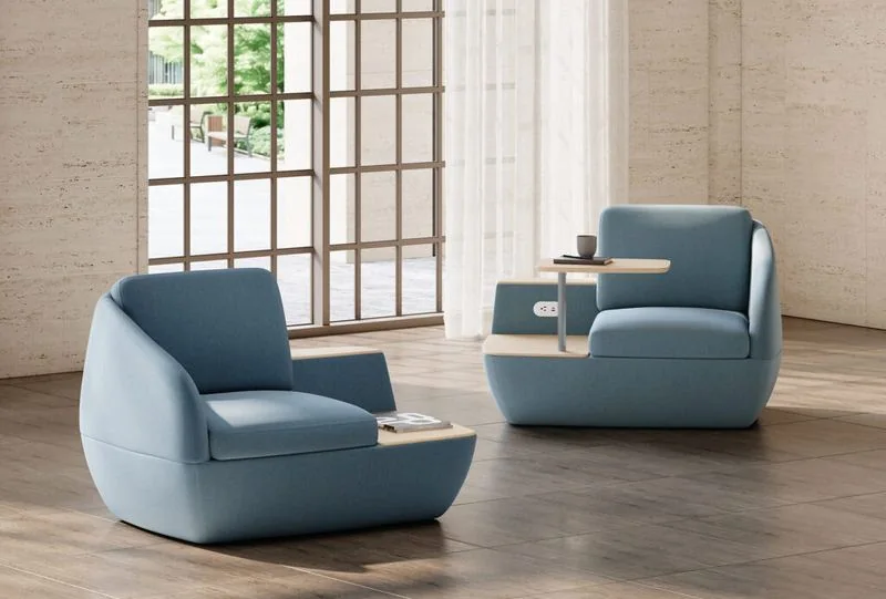 Light blue lounge chairs with tablet arms