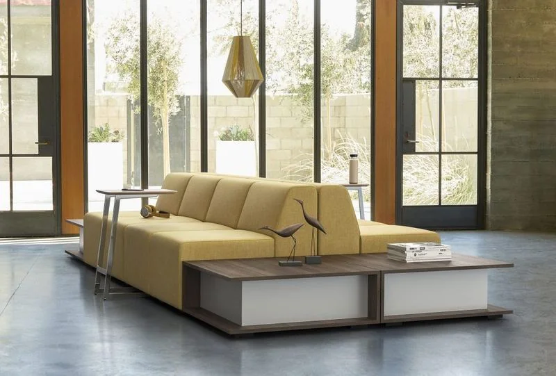 Mustard modular seating with built-in tables