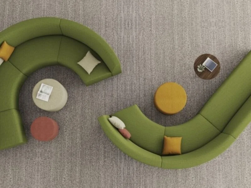 Overhead view of a green curved modular sofa