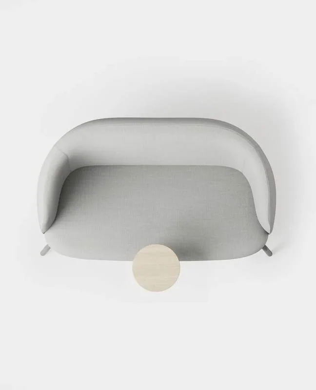 Overhead view of a white lounge chair and ottoman