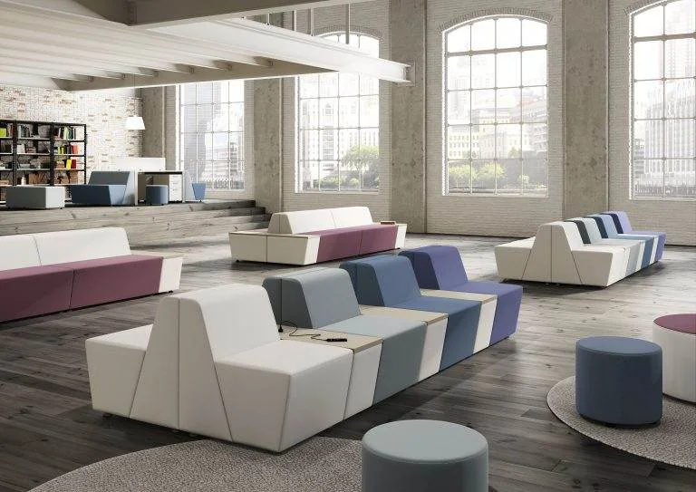 Plum and blue modular seating in a loft