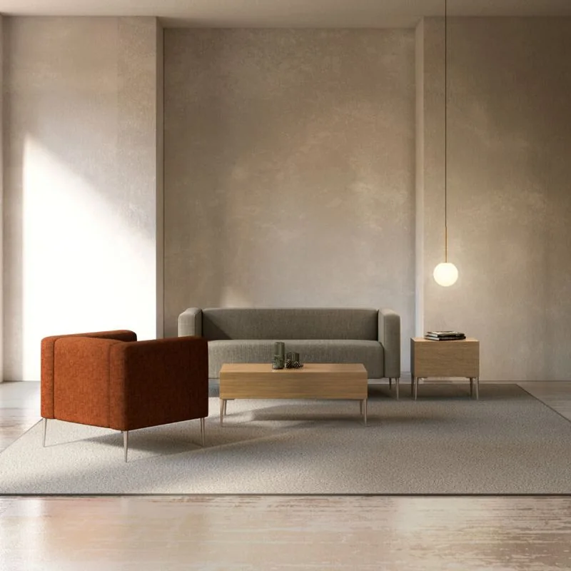 Rust lounge chair and gray sofa in a warm room