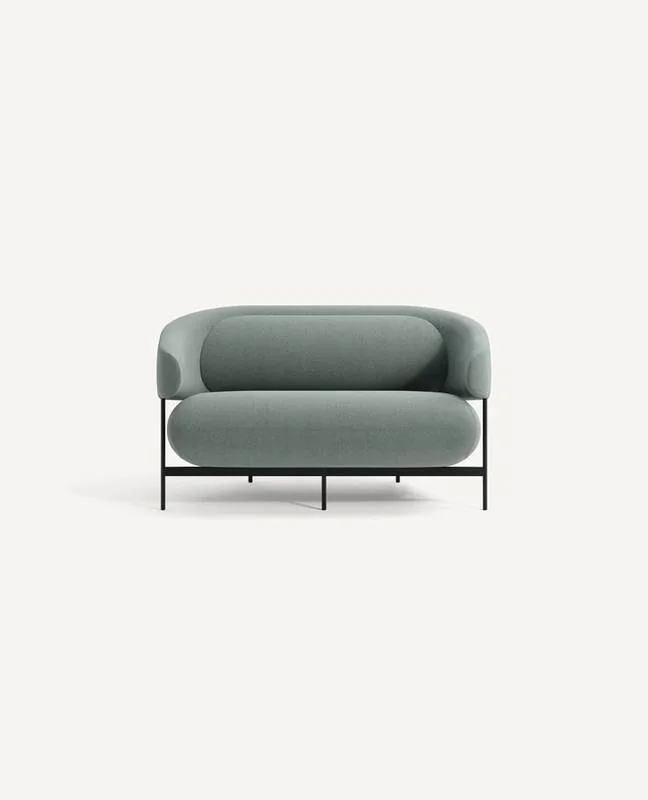 Sage green tub lounge chair on black legs