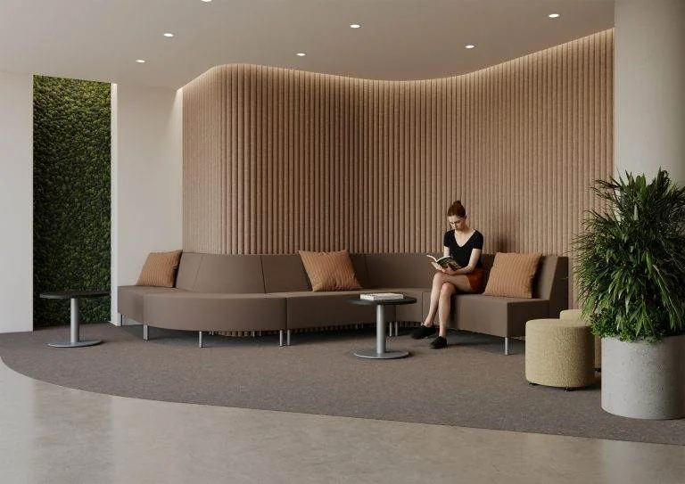 Taupe curved banquette along a wood-slat wall