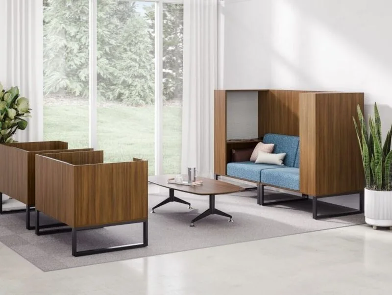 Walnut box lounge units with blue cushions