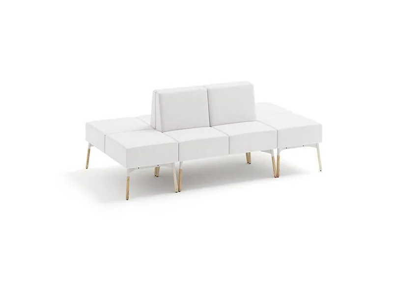 White modular lounge seating with low back and light wood legs