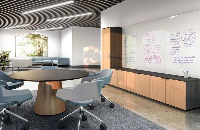 Private Office Office with round meeting table and whiteboard storage wall