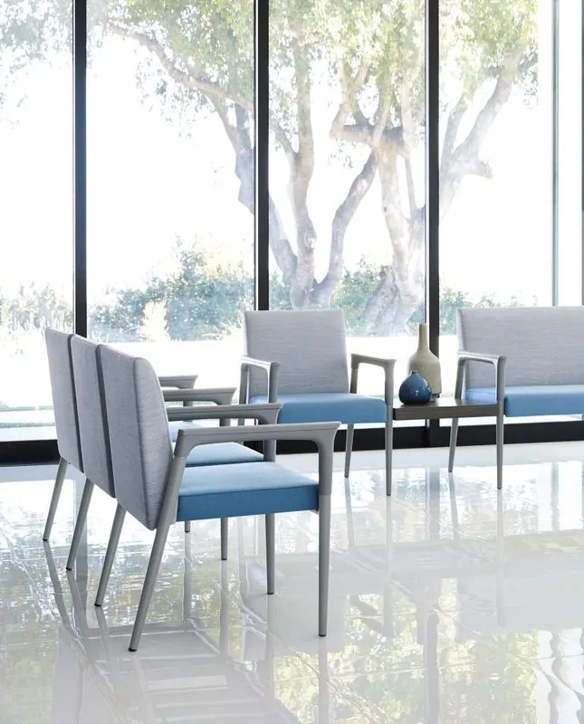 Waiting Area Gray and blue waiting chairs by floor-to-ceiling windows