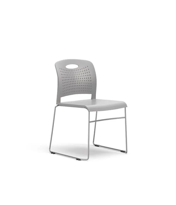 Stacking Chair Gray perforated-back stacking chair, three-quarter view