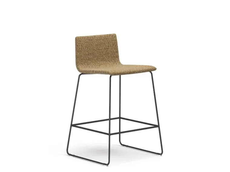 Bar Stool Tan bentwood shell bar stool on black sled