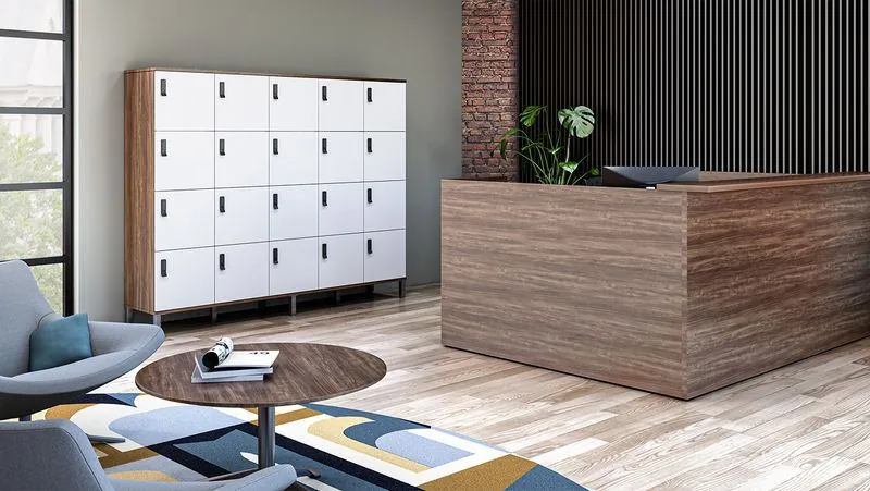 White storage lockers behind a reception desk