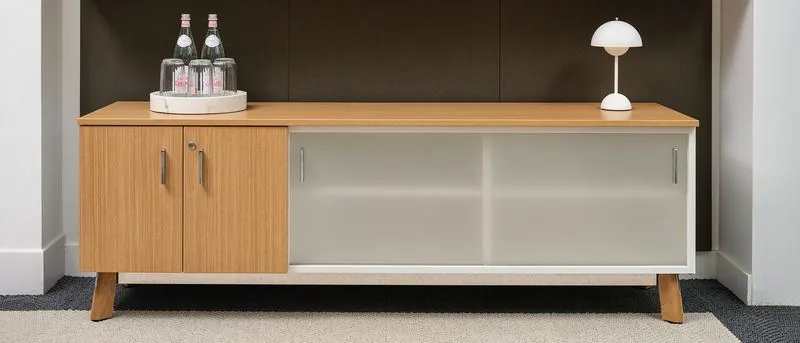 Wood credenza with frosted glass sliding doors