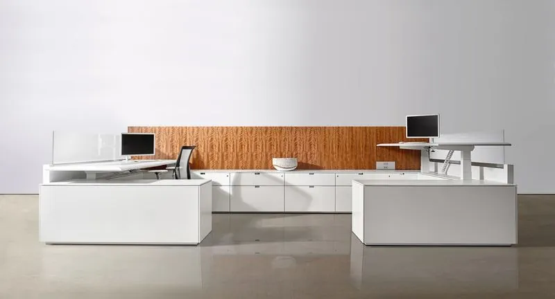 Open Plan Workstations White workstations with wood accent wall in an open plan
