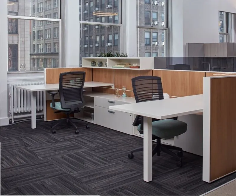 Workstation Wood and white workstation in a city-view office
