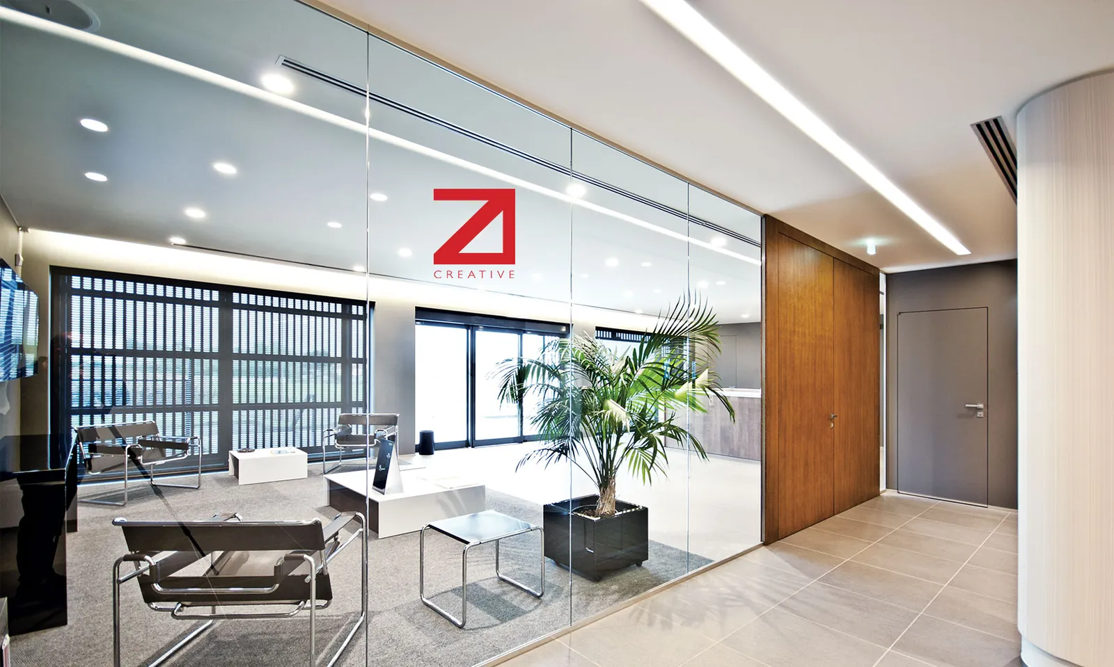 Zi Creative Glass Office Glass-walled executive office with mono glass partitions