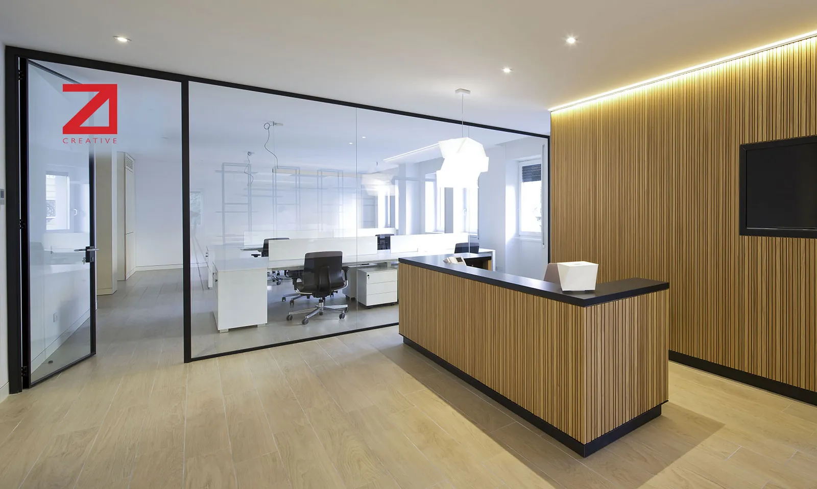 Zi Creative Glass Office Glass-walled reception and offices with frameless mono glass partitions