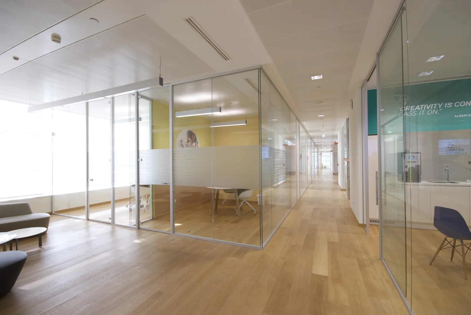 Glass Office Fronts Mono glass private offices with frosted bands and wood floors