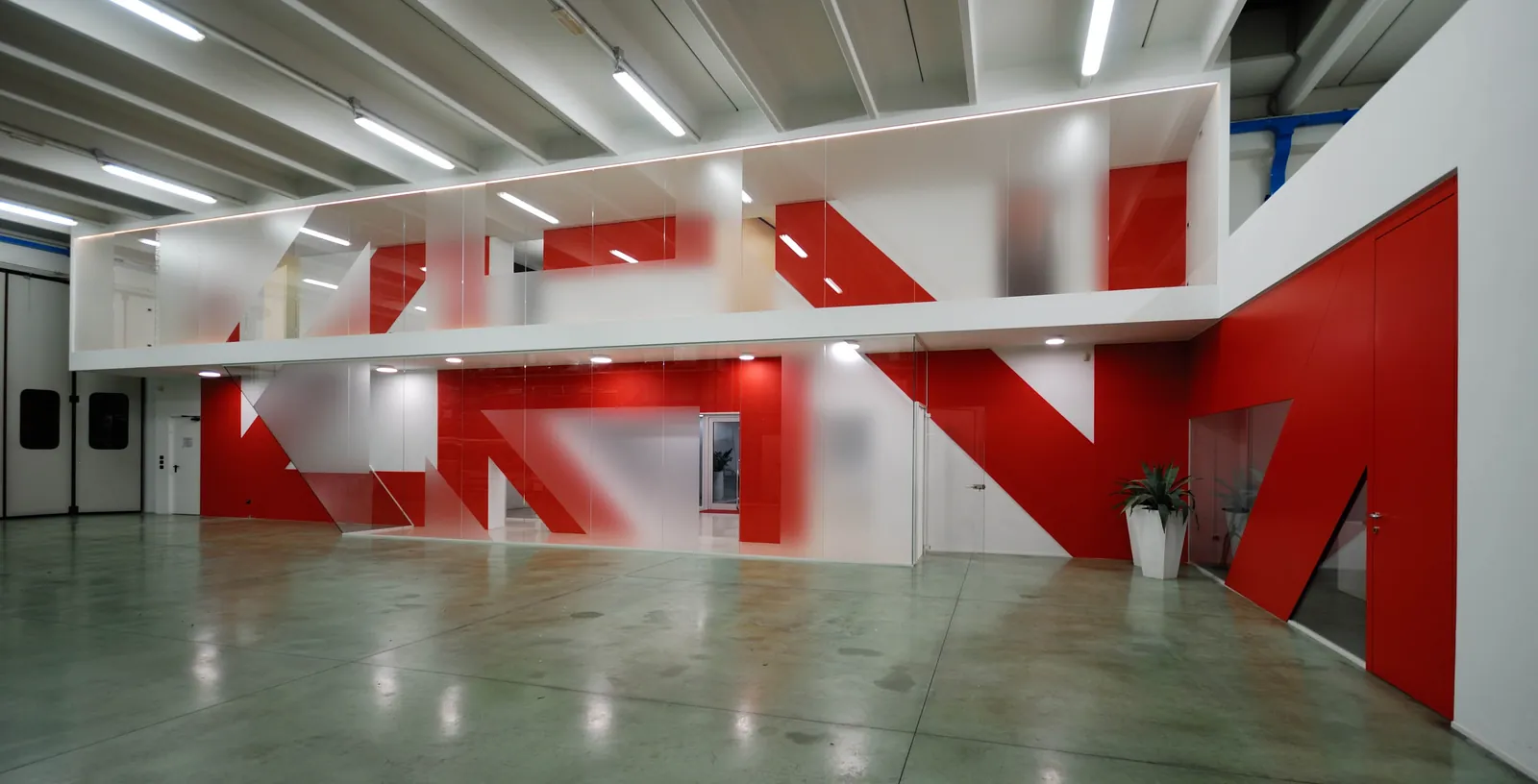 Solid Wall Graphics Solid partition wall with bold red graphic panels