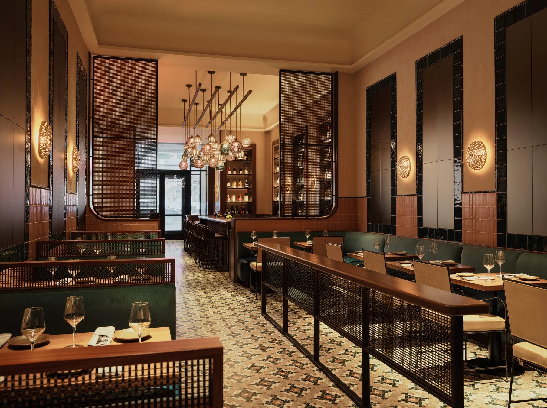 Restaurant dining room — Metal & Glass · Bronze screens & banquette rails