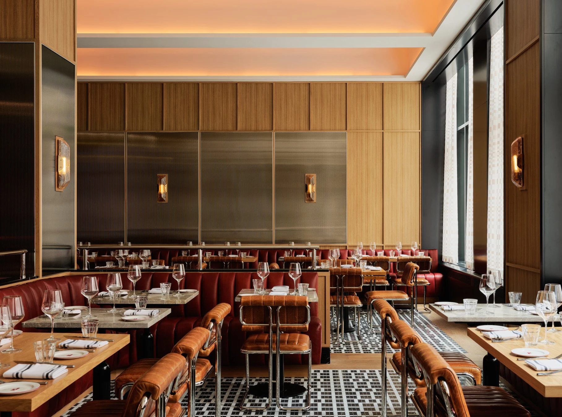 Restaurant dining room — Metal & Glass · Bronze-framed reeded glass panels
