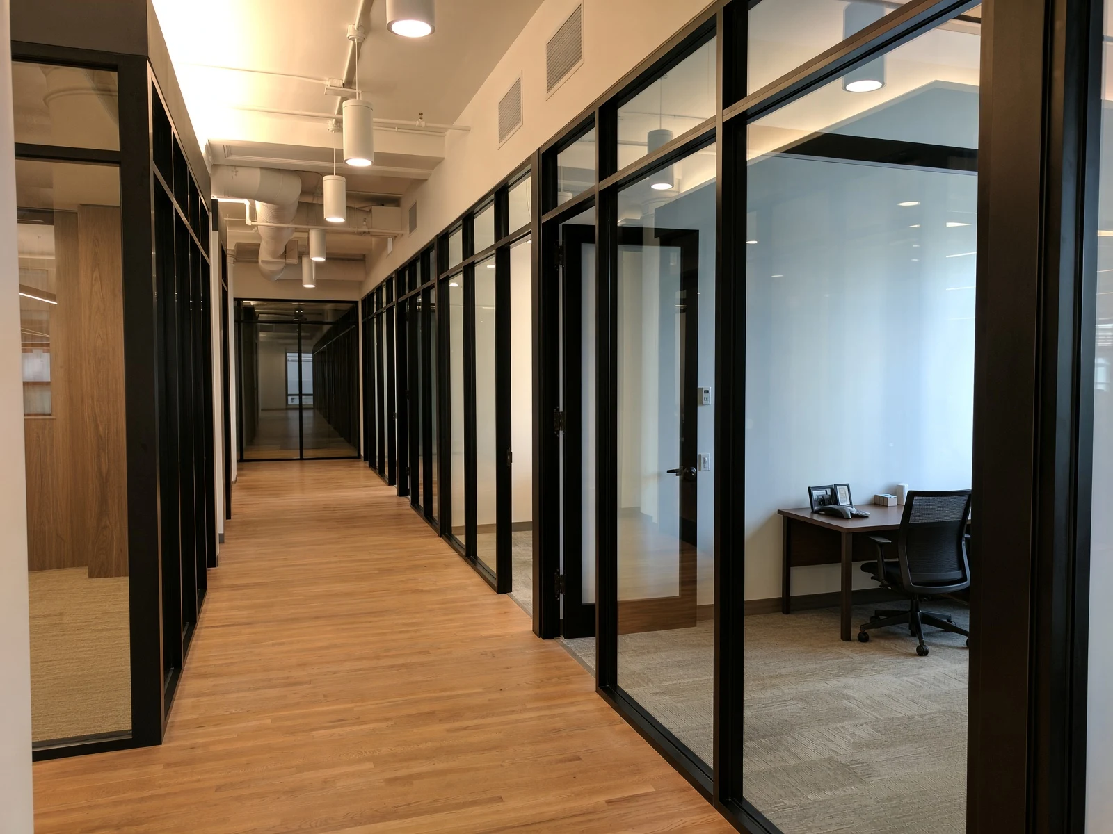 Private offices — Glass walls · Custom framed glass fronts